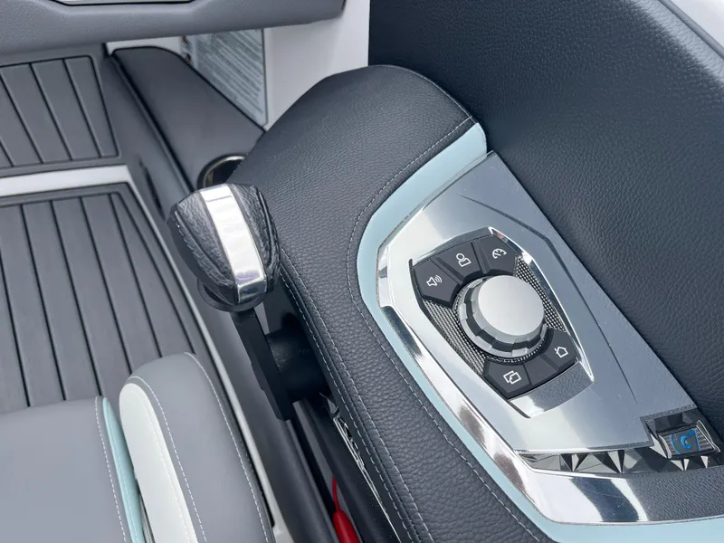 Slide: The Image of 2024 Nautique Super Air G25 control panel with sleek design and modern features. - 14