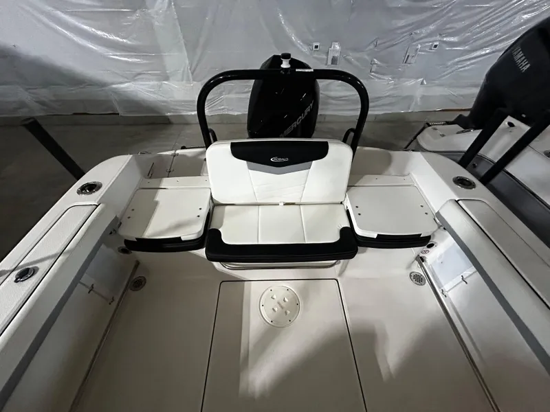 Slide: The Image of 2023 Robalo 207 boat interior with seating and storage compartments. - 5