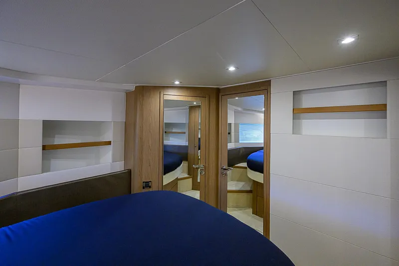 Slide: The Image of Interior of 2017 Beneteau Gran Turismo 49 yacht, featuring modern design and cozy bedroom. - 31