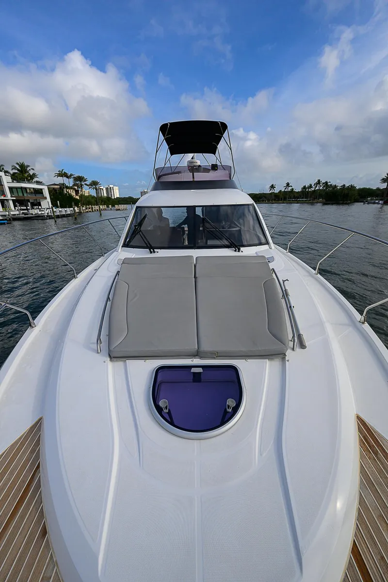 Slide: The Image of 2017 Beneteau Gran Turismo 49 yacht on water, showcasing sleek design and spacious deck. - 37