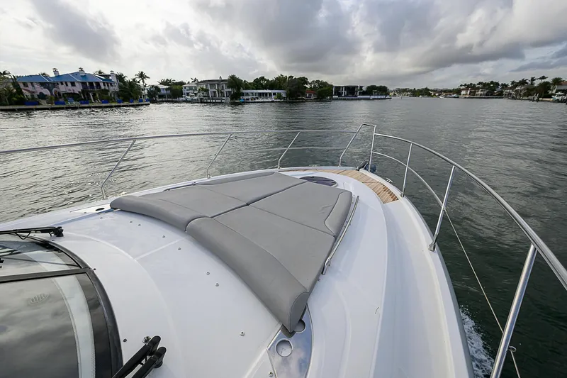 Slide: The Image of 2017 Beneteau Gran Turismo 49 yacht cruising on a scenic waterway. - 39