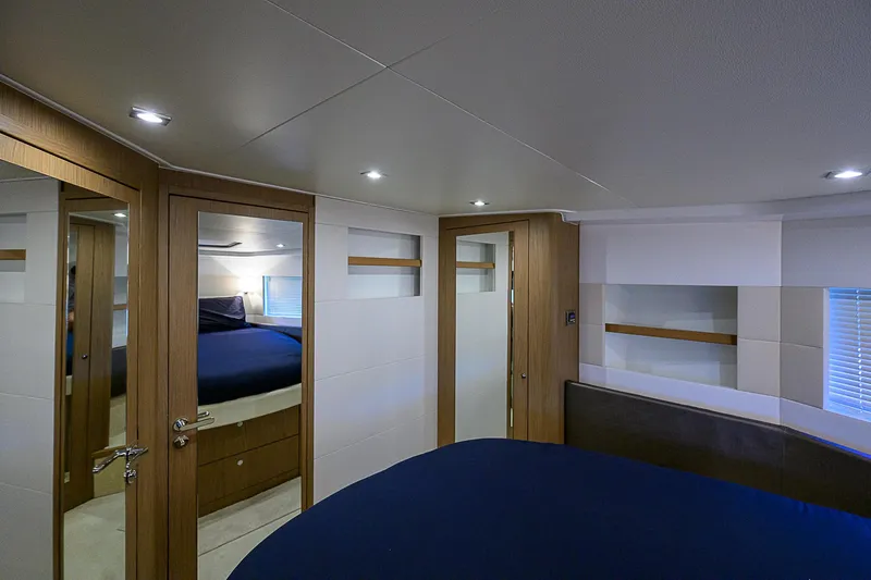 Slide: The Image of Interior of 2017 Beneteau Gran Turismo 49 yacht, featuring modern design and cozy bedroom. - 42