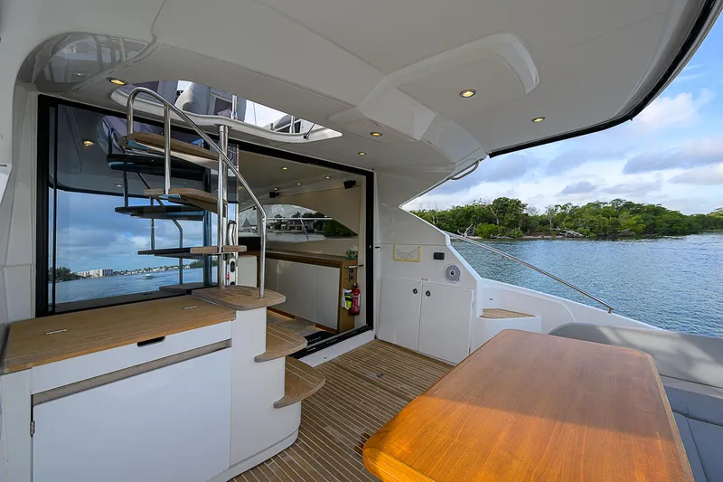 Slide: The Image of 2017 Beneteau Gran Turismo 49 yacht interior with modern design and scenic water view. - 47