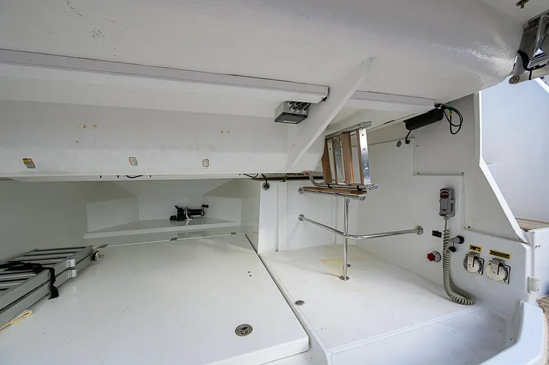 Slide: The Image of 2017 Beneteau Gran Turismo 49 yacht interior, featuring storage and utility area. - 54