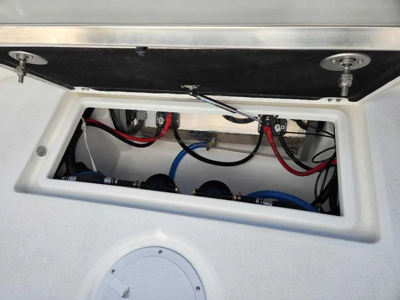 Slide: The Image of 2025 Sea Fox 288 Commander boat wiring compartment with cables and connectors. - 12