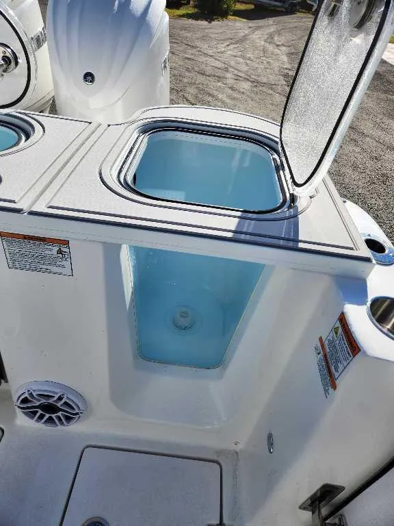 Slide: The Image of Open storage compartment on 2025 Sea Fox 288 Commander boat. - 14