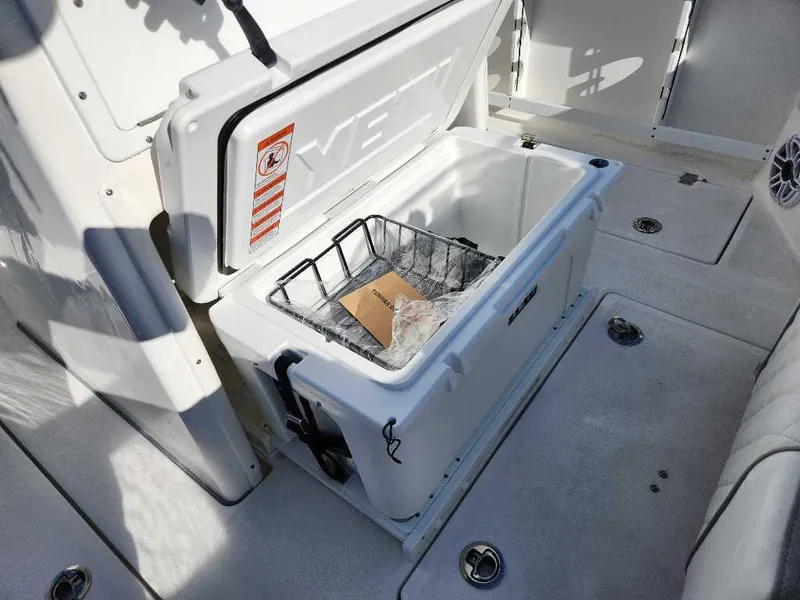 Slide: The Image of 2025 Sea Fox 288 Commander boat with open Yeti cooler on deck. - 19