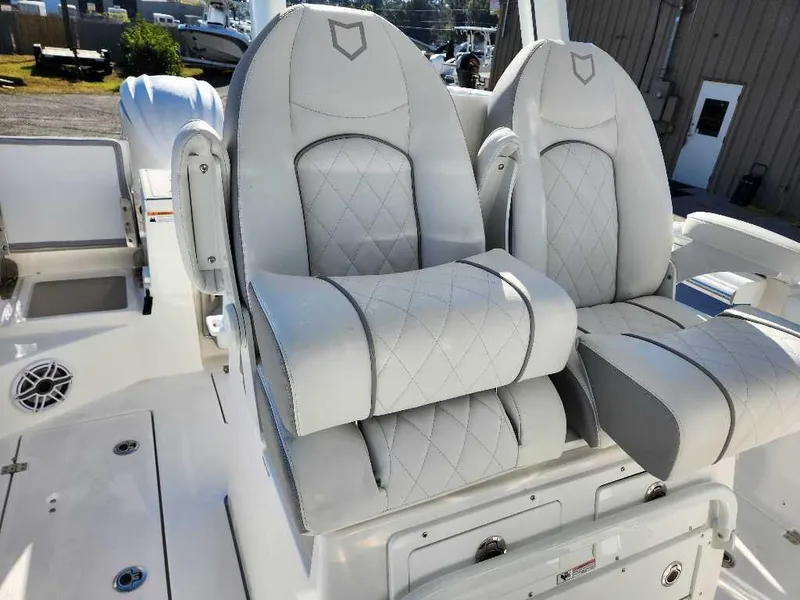 Slide: The Image of Luxurious seating on 2025 Sea Fox 288 Commander boat, featuring elegant diamond-stitched upholstery. - 24