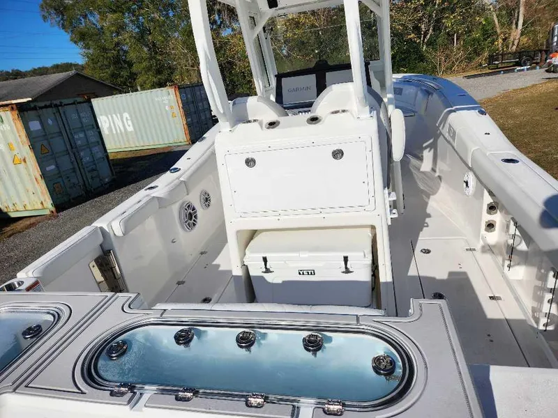 Slide: The Image of 2025 Sea Fox 288 Commander boat interior with storage and seating. - 7