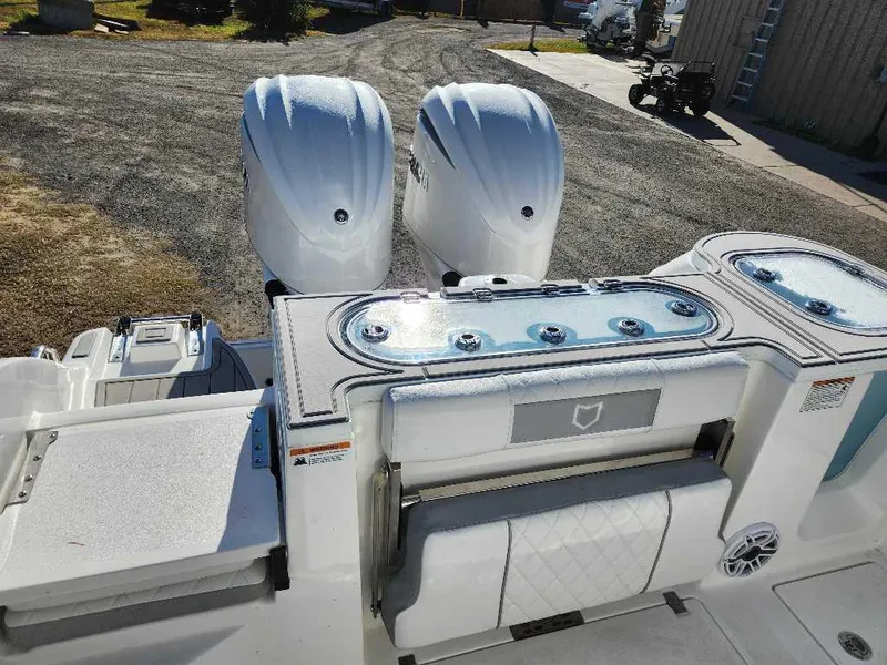 Slide: The Image of 2025 Sea Fox 288 Commander boat with dual engines and sleek deck design. - 8