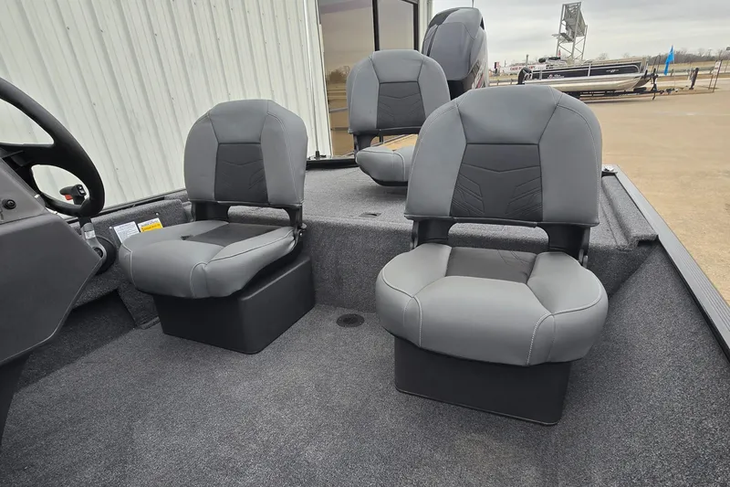 Slide: The Image of 2025 Tracker Bass Tracker Classic XL boat interior with gray seating. - 6