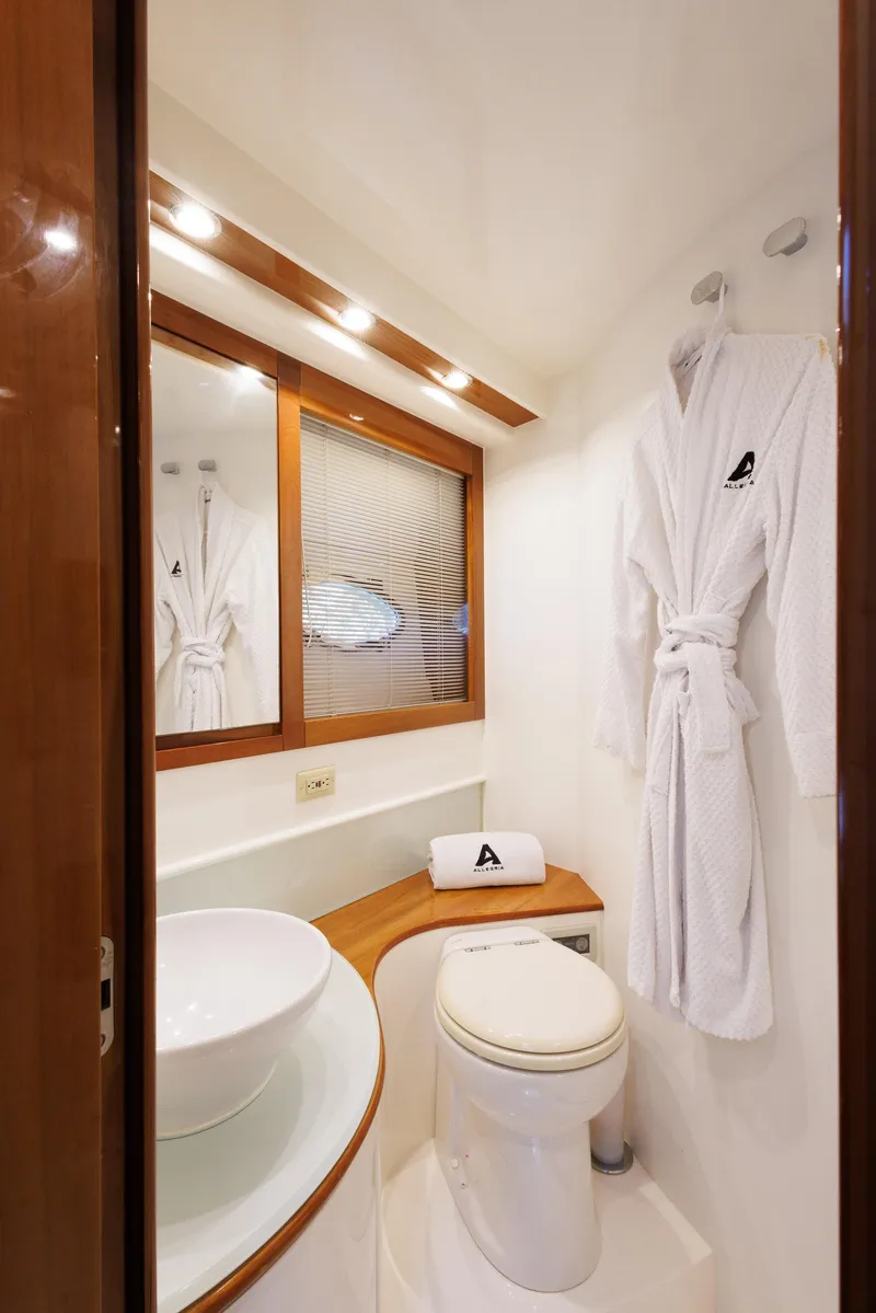 Slide: The Image of Luxurious bathroom in 2008 Pershing 50 yacht with modern fixtures and elegant design. - 21