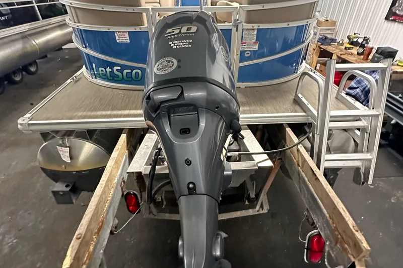 Slide: The Image of 2022 Starcraft LX 18 R pontoon boat with Yamaha 50 HP outboard motor. - 4