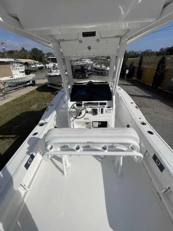 Slide: The Image of 2025 Sea Fox 248 Commander boat interior with helm and seating. - 11