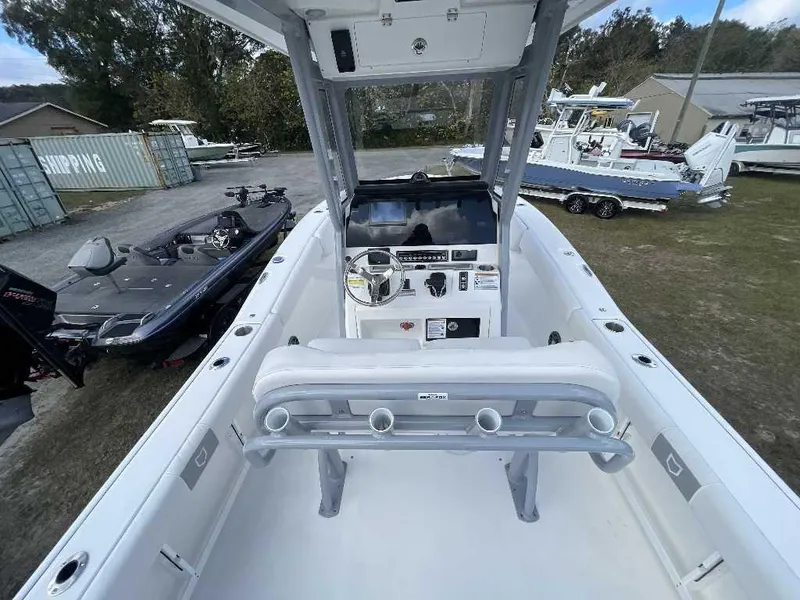 Slide: The Image of 2025 Sea Fox 248 Commander boat interior with steering console and seating. - 4