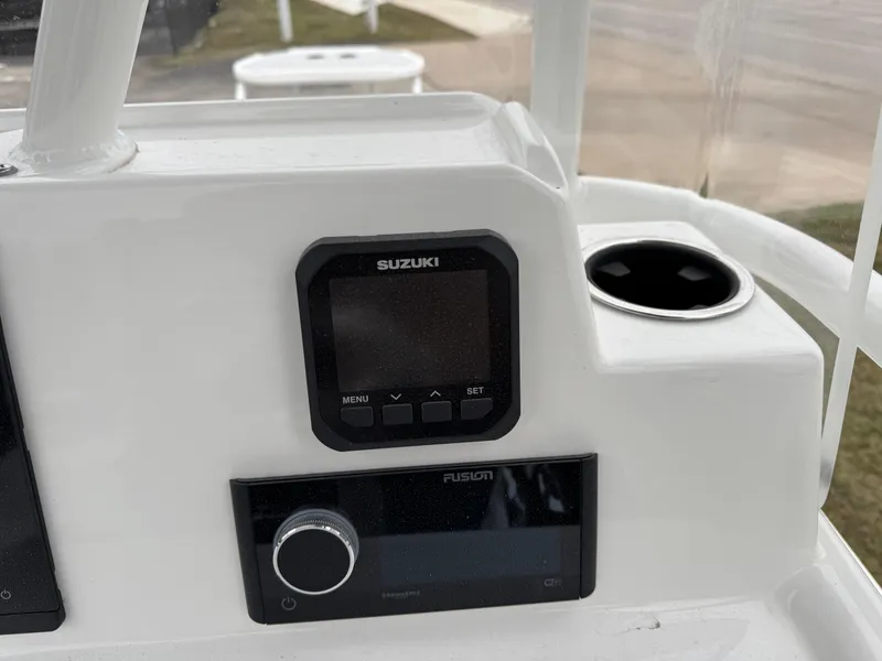 Slide: The Image of Dashboard of 2025 Shallow Sport 24 Modified V with Suzuki and Fusion controls. - 15