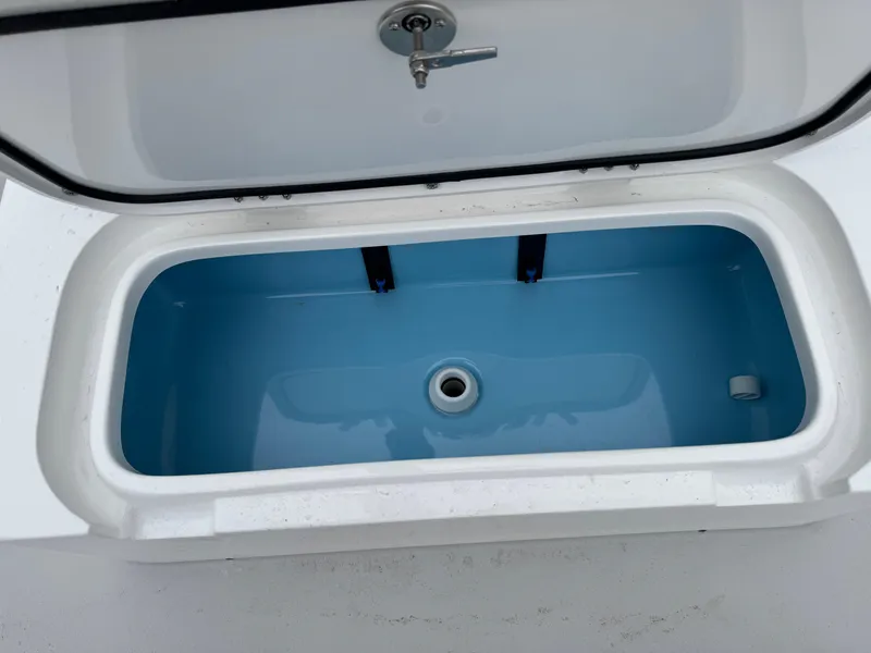 Slide: The Image of Livewell in 2025 Shallow Sport 24 Modified V boat, open lid view. - 30