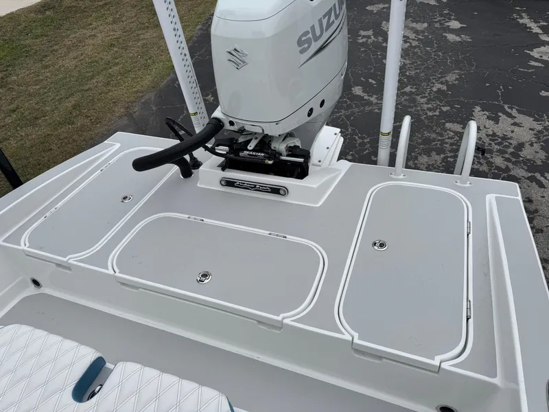 Slide: The Image of 2025 Shallow Sport 24 Modified V boat with Suzuki outboard motor. - 39
