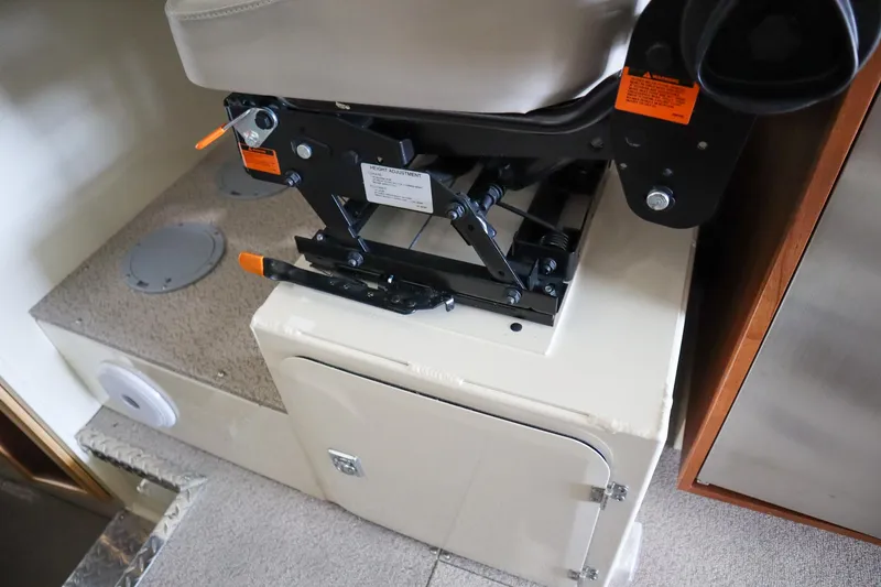 Slide: The Image of Interior seating and storage of 2025 Hewescraft 290 Adventure ET HT boat. - 31
