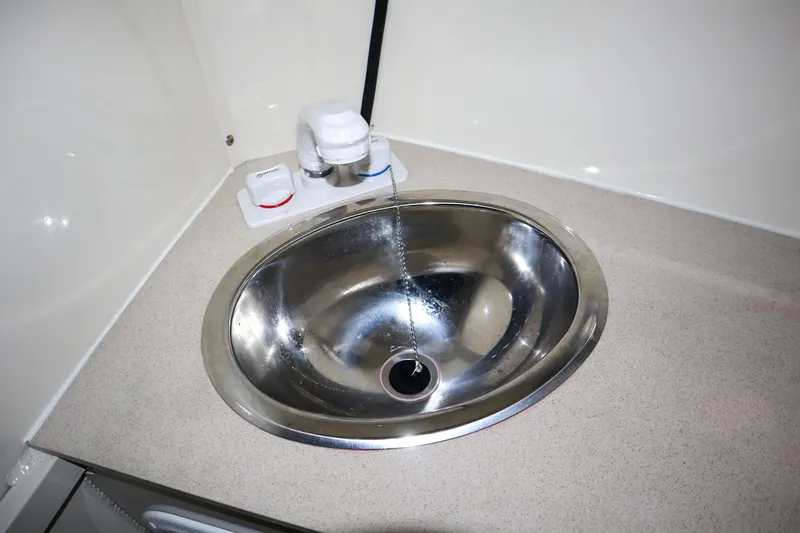 Slide: The Image of Stainless steel sink in 2025 Hewescraft 290 Adventure ET HT boat interior. - 37