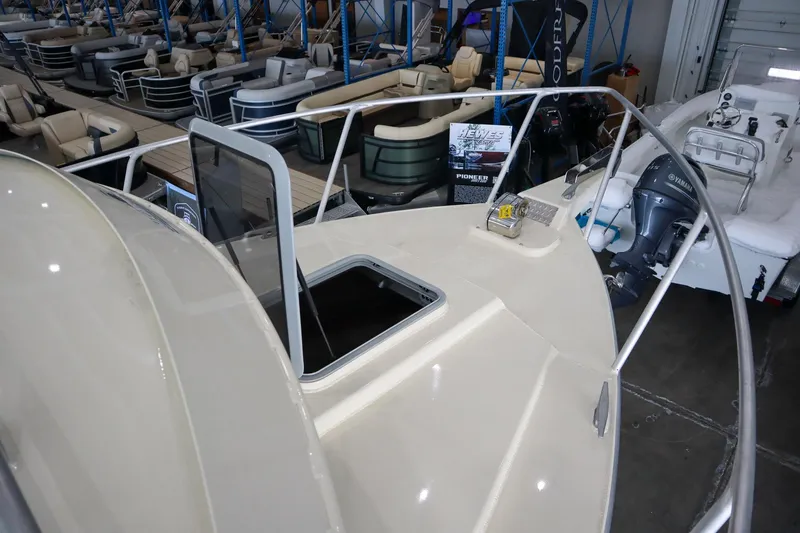 Slide: The Image of 2025 Hewescraft 290 Adventure ET HT boat displayed in showroom. - 41