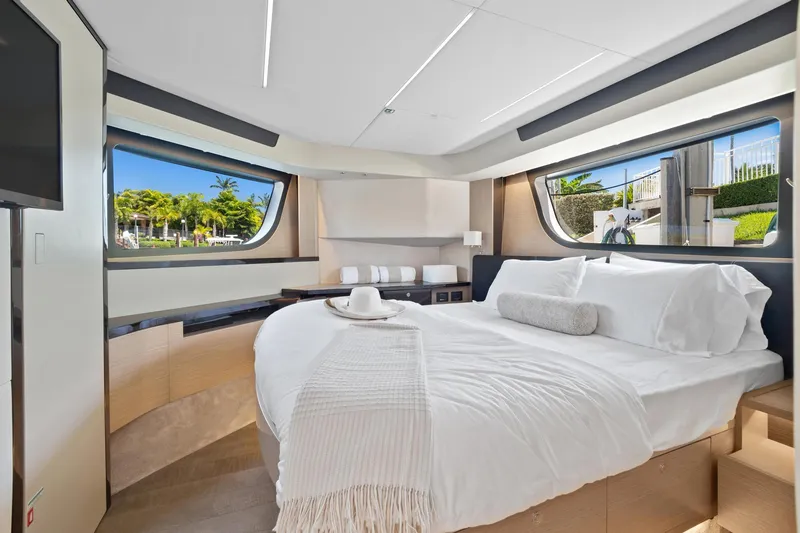 Slide: The Image of Luxurious interior of 2022 Absolute 48 Coupe yacht with elegant bedroom design. - 32