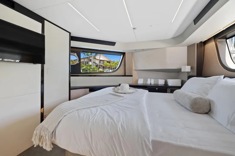 Slide: The Image of Luxurious interior of 2022 Absolute 48 Coupe yacht with elegant bedroom design. - 33
