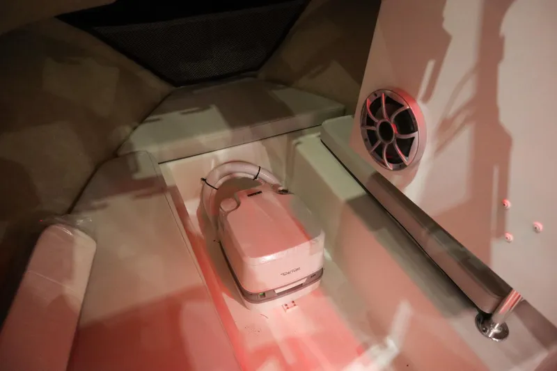 Slide: The Image of Interior of 2025 Parker 2120 Sport Cabin with compact toilet and speaker. - 15