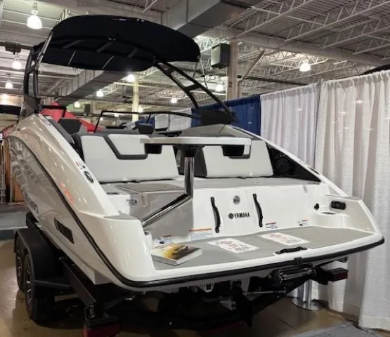 Slide: The Image of 2025 Yamaha Boats AR250 displayed indoors, showcasing sleek design and modern features. - 2