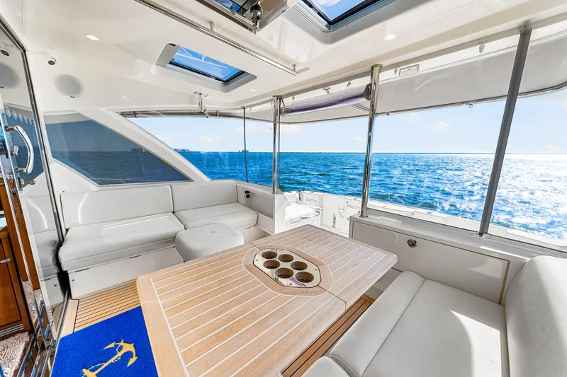 Slide: The Image of Luxurious interior of 2022 Riviera 505 SUV yacht with ocean view. - 39