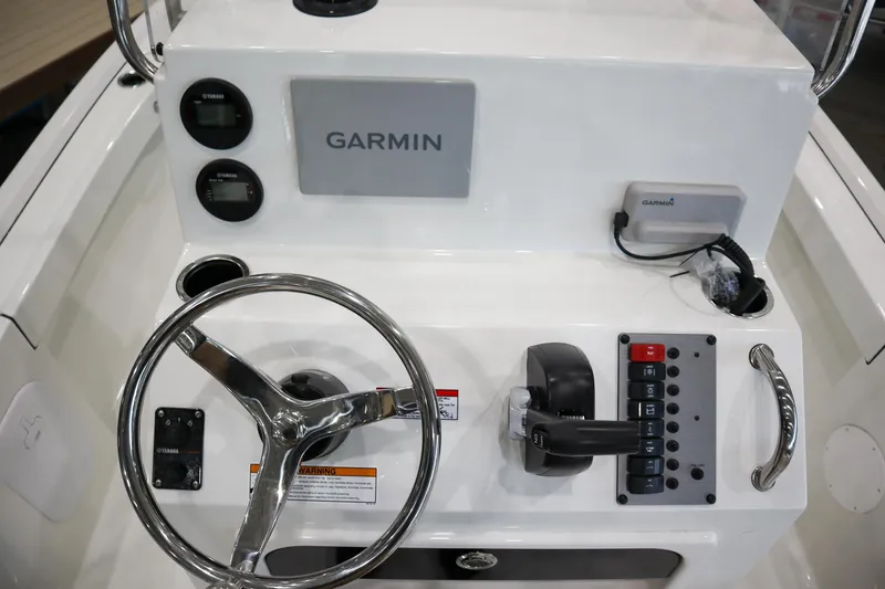 Slide: The Image of Center console of 2025 Parker 18SE boat with Garmin navigation system. - 9