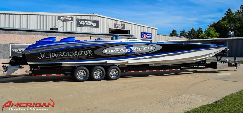 The Image of 2005 Cigarette 45 Maximus boat on trailer outside American Custom Marine building. - 0