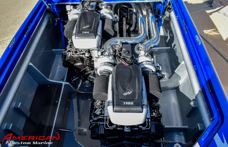 Slide: The Image of Engine compartment of a 2005 Cigarette 45 Maximus boat, featuring twin high-performance engines. - 11