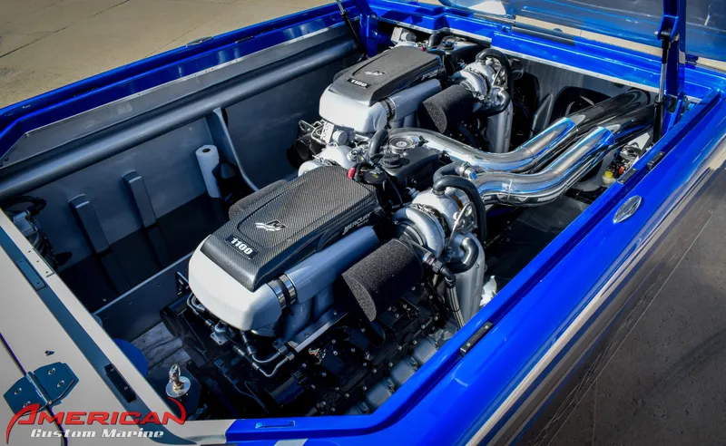 Slide: The Image of 2005 Cigarette 45 Maximus engine compartment with dual high-performance engines. - 12