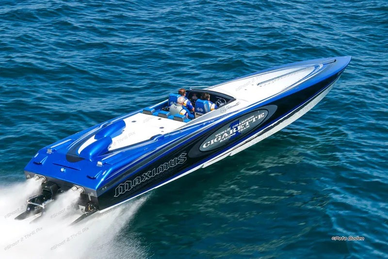 Slide: The Image of 2005 Cigarette 45 Maximus speedboat cruising on open water. - 15