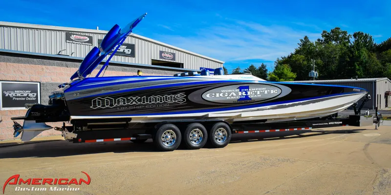 Slide: The Image of 2005 Cigarette 45 Maximus powerboat on trailer, parked outside American Custom Marine. - 2