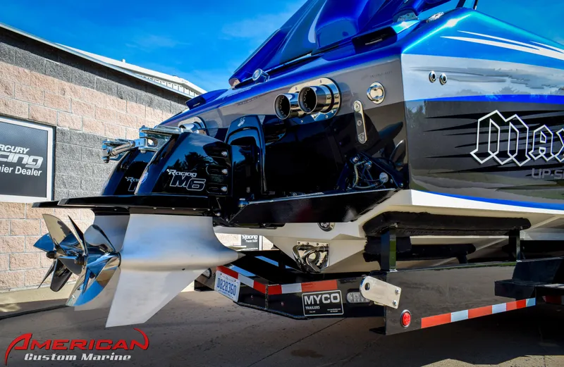 Slide: The Image of 2005 Cigarette 45 Maximus boat with powerful engine and sleek design at American Custom Marine. - 5