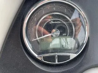 Slide: The Image of 2024 Barletta C22UC speedometer displaying RPM and digital readout. - 11