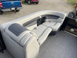 Slide: The Image of 2024 Barletta C22UC boat interior with plush seating and modern design. - 7