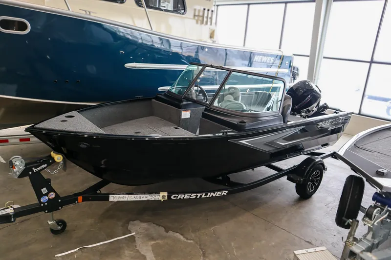 The Image of 2025 Crestliner 1650 KODIAK WT boat on trailer in showroom. - 0