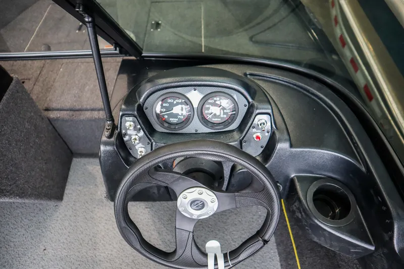 Slide: The Image of 2025 Crestliner 1650 KODIAK WT dashboard with steering wheel and instrument panel. - 9