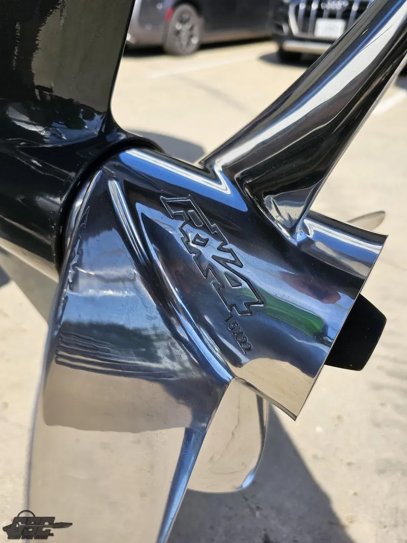 Slide: The Image of Close-up of a shiny propeller on a 2021 Manitou 25 X-Plode boat. - 47
