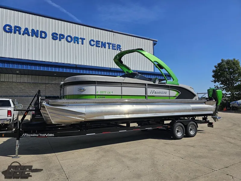 Slide: The Image of 2021 Manitou 25 X-Plode pontoon boat on trailer at Grand Sport Center. - 5