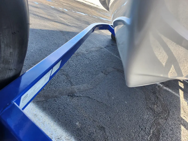 Slide: The Image of 2014 Tahoe Q5i SF boat trailer on asphalt, close-up view. - 7