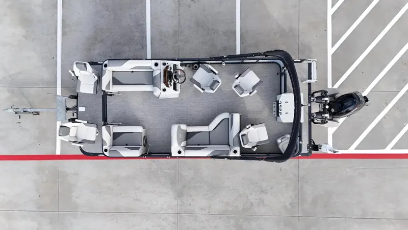 Slide: The Image of Overhead view of 2023 Avalon VEN 2180 FNC pontoon boat in parking lot. - 19