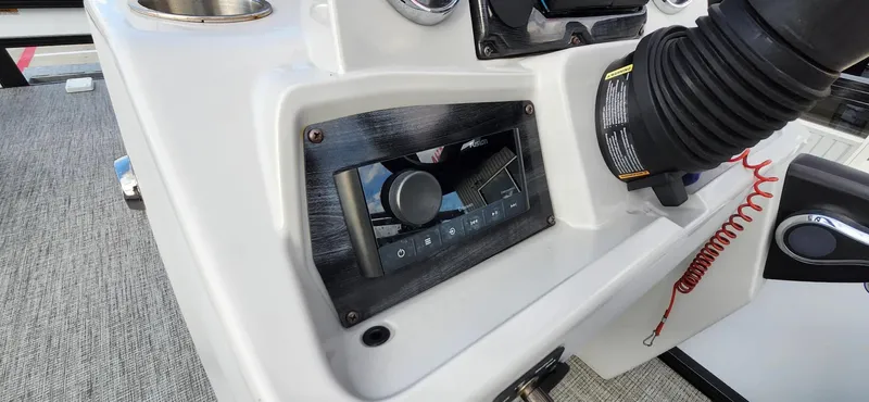 Slide: The Image of Control panel of 2023 Avalon VEN 2180 FNC boat with modern dashboard features. - 33