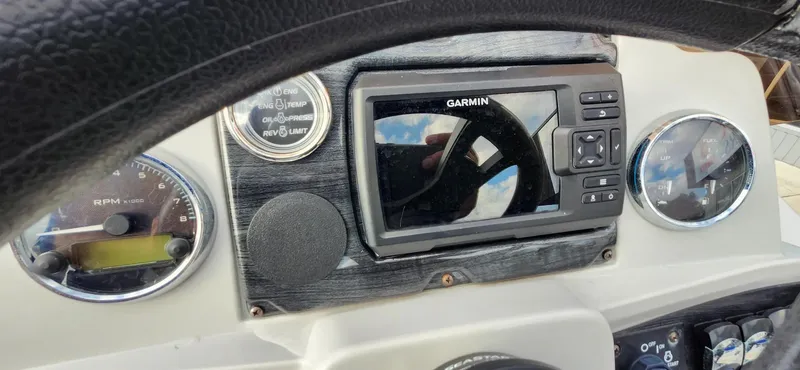 Slide: The Image of Dashboard of 2023 Avalon VEN 2180 FNC with Garmin GPS and gauges. - 34