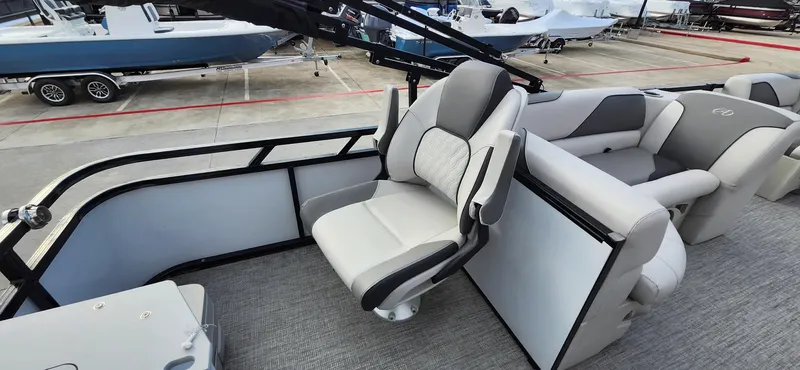 Slide: The Image of 2023 Avalon VEN 2180 FNC boat interior with modern seating and sleek design. - 39