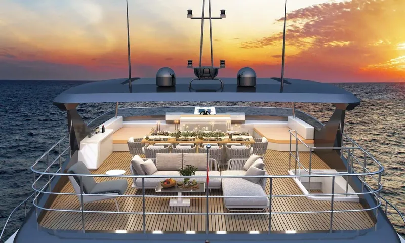 Slide: The Image of Luxurious 2025 Catamaran Diamond Yachts EF66 at sunset, featuring elegant outdoor seating. - 6