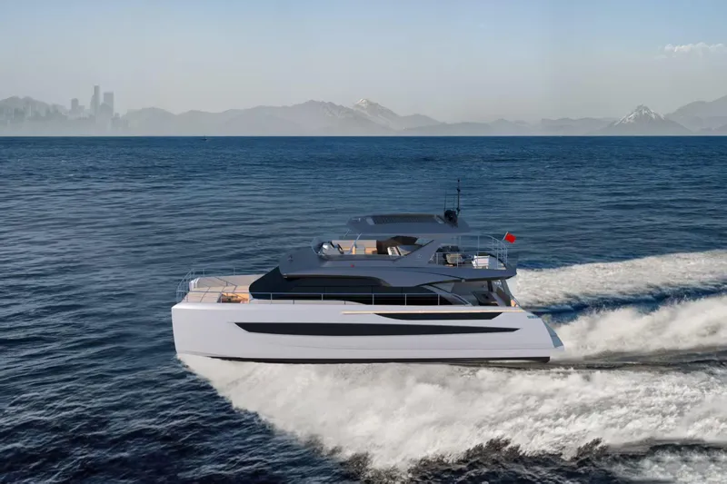 Slide: The Image of 2025 Catamaran Diamond Yachts EF66 cruising on open sea under clear blue sky. - 3